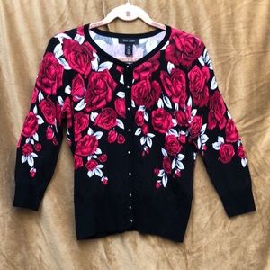 Woman’s beautiful button down the front burgundy, red white and black Cardigan